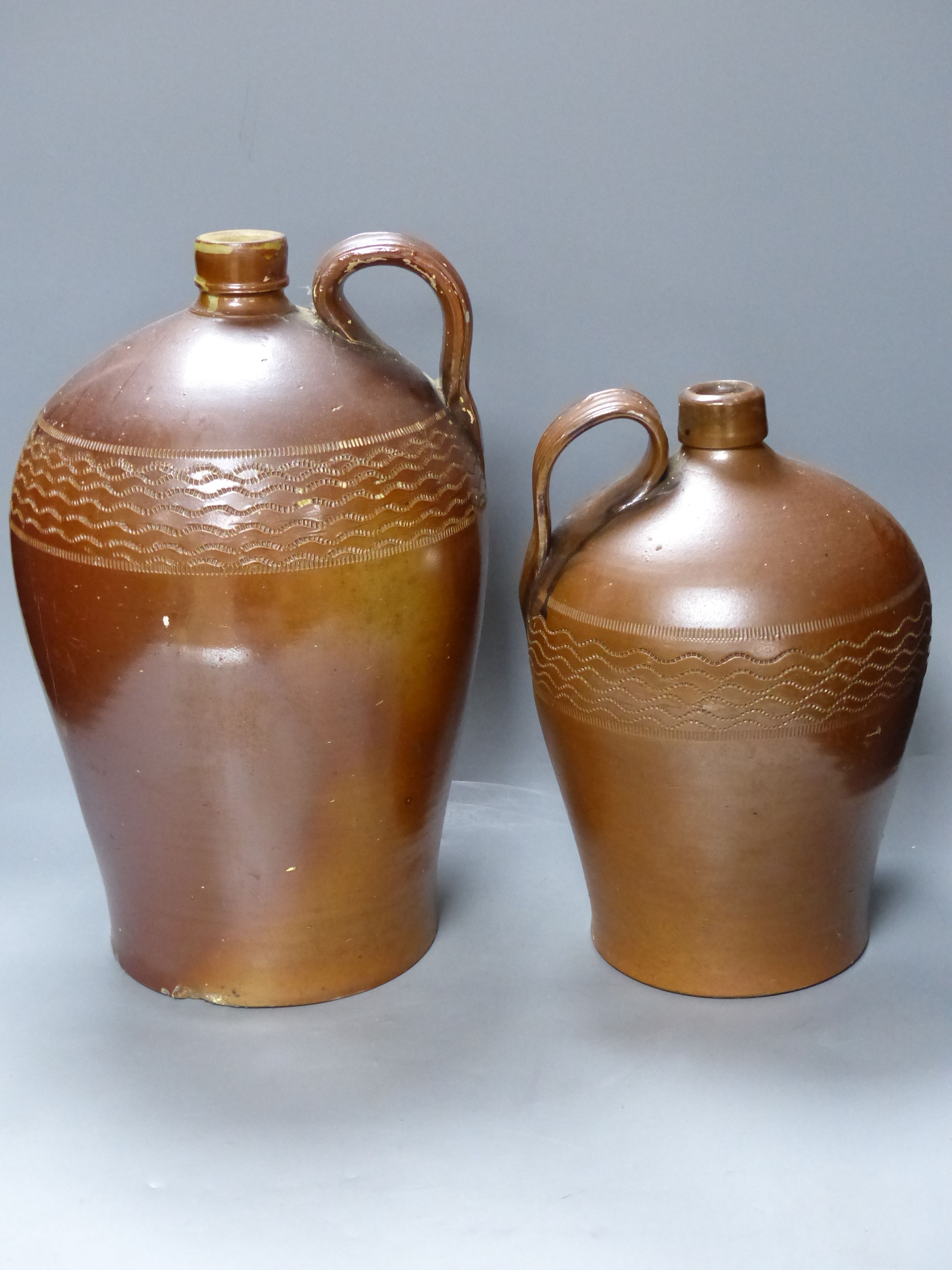 Two Victorian flagons and a jug (3)